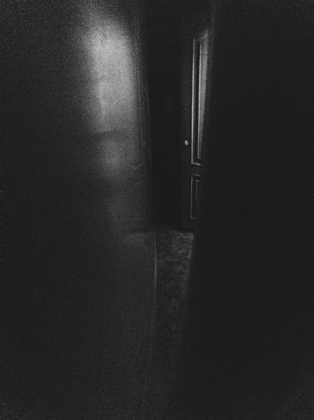 grey hallway and door